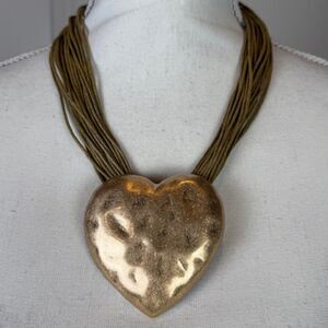 NWT Rustic Heart Necklace Hammered Gold Tone on cords. Aged‎ gold tone